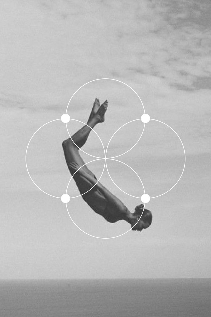 Black and white photograph of a diver suspended mid-air symbolizing the leap of bouncing back
